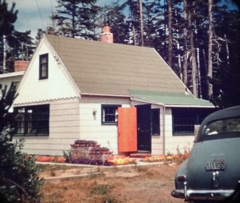 The sun porch finished, sidewalks in, and the brick planter Orma paid a mason to build at the front of the patio.