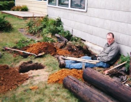 Dave was exhausted trying to dig the holes for the two main poles that will hold up the wind screen. Digging the first couple of feet was fairly easy -- then he had to chip through the hard-pan soil.