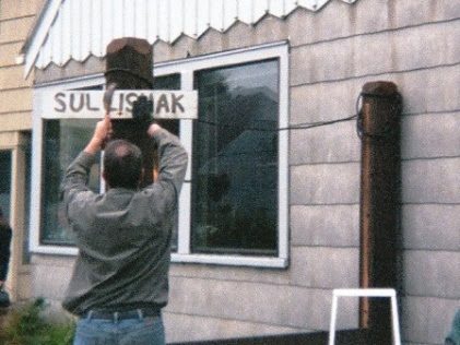 The Sullishak sign gets moved from the flag pole (seen in a photo above) to the new wind screen pole.