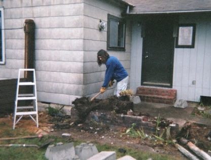 Nancy and Mick arrived next. Mick tackled the job of demolishing the brick planter.