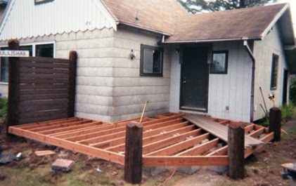 We've completed installing the floor joist on 12" centers. We decided to build the deck out of Trex ... a product made from plastic and sawdust. Trex isn't as sturdy as real wood, so we needed lots of joists to support it firmly.