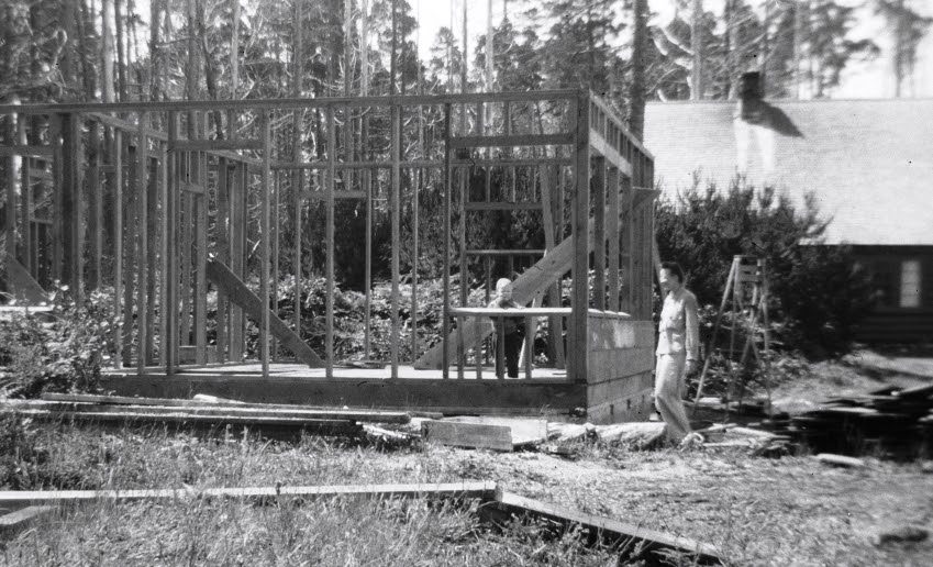 Photos 6 and 7: Two pictures of the cabin's framing with Elsie and Steve. If you look carefully, you can see the Lantz home foundation next door has been...
