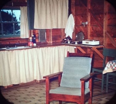 Photo 16: A rare color photo of the early cabin's interior.
