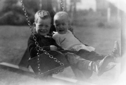 Nancy is getting old enough to be in a swing. The swing and slide set (on right) may have been built by my grandfather, John. In the picture on the right my grandfather, Austin, is pushing the swing. These pictures would have been at the 12th street house but I think the swing may have made it to Manbrin Gardens.