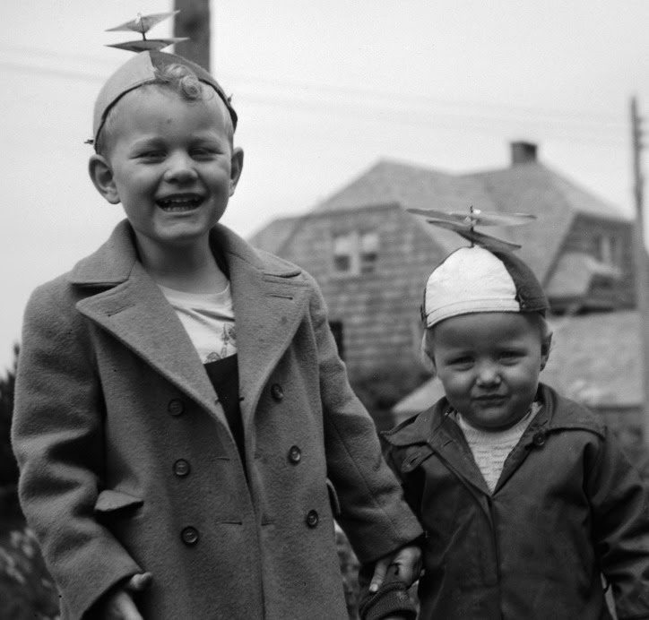 I think my parents thought it was cute when we wore these hats but my recollection was of being a clown.