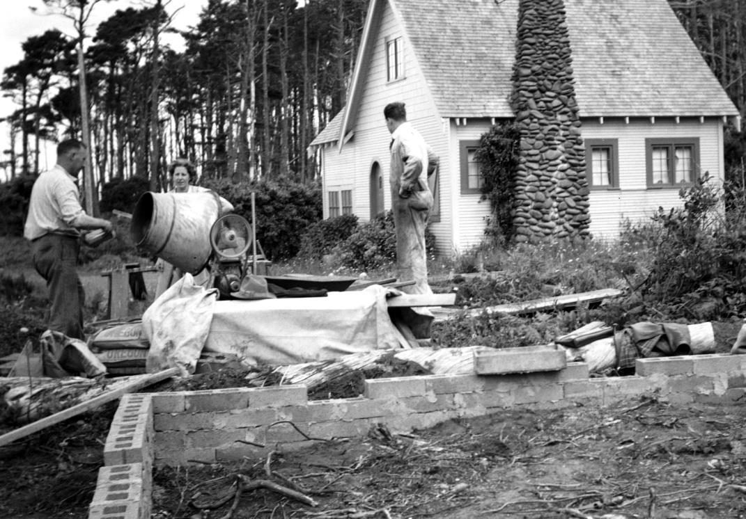 Vera and Jewell Lantz (and some unknown helper) begin building their home next door. They used an electric mixer for their foundation.