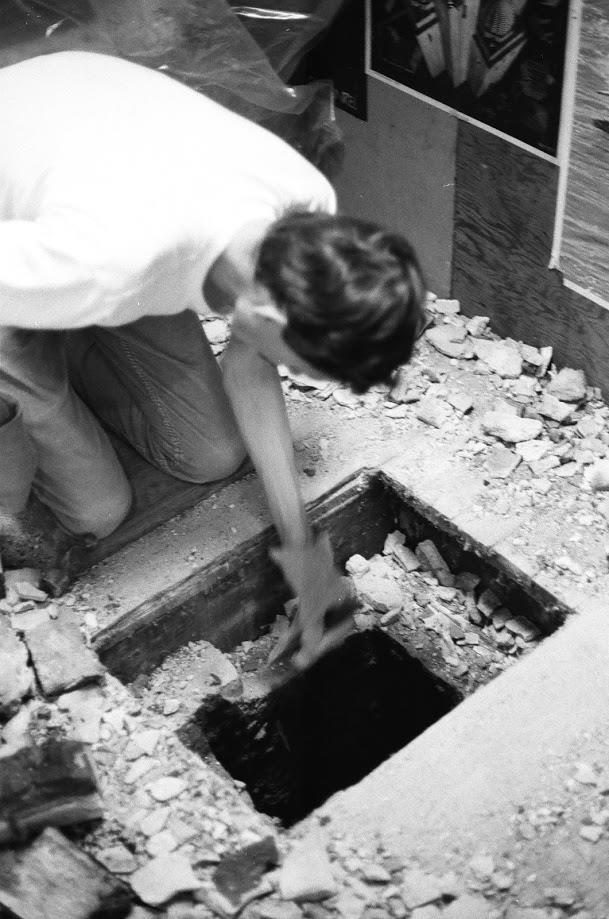 Steve attempts to remove chimney bricks in the first-floor's ceiling.