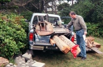 Left: Barb and Dave arrived at the cabin with a load of materials. The telephone pole cost $75, and it was cut into a bunch of shorter pieces.