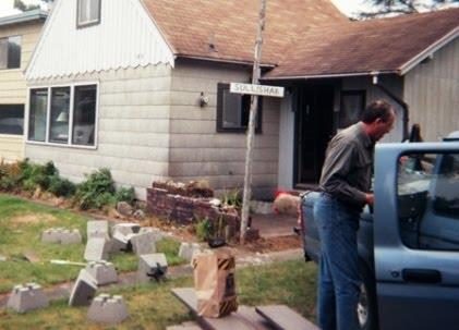 Right: Look at the planter box made of brick at the front of the porch. This had to be removed in order to build the deck