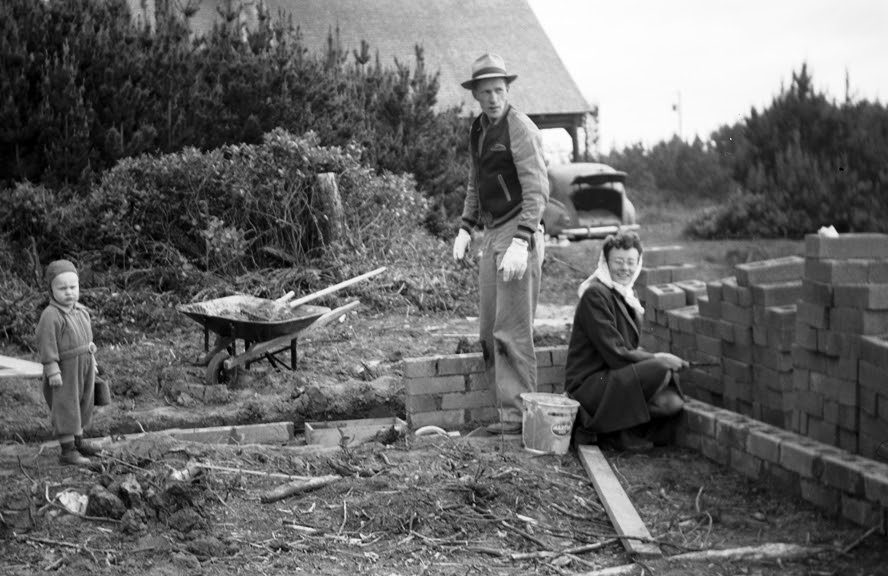 Wes, Elsie and Steve lay the foundation blocks for Sullishak in the spring of 1947. Nancy, two months old, is asleep in the back of the 1940 Mercury.