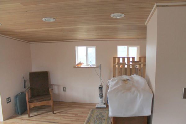 Now: the upstairs in 2014, finished, with the dormer windows and the cedar ceiling.