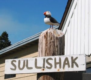 The cabin's concrete puffin, photographed during the 2004 roofing project.