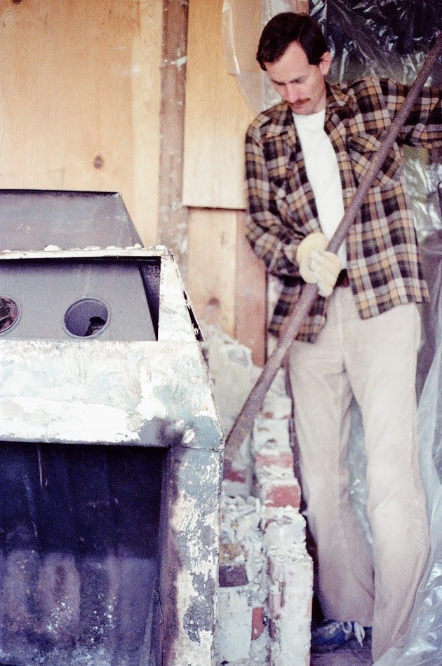 Dave and Steve begin laying bricks for the wood stove, 1981.